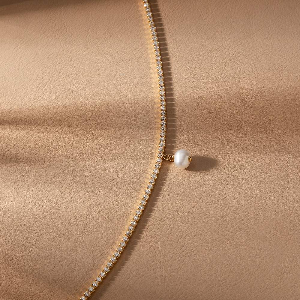 detaliu bratara tennis morellato aurie cu perla de cultura