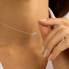 colier din argint 925 rodiat cu inima in diamante cz albe montate pave purtat la gat