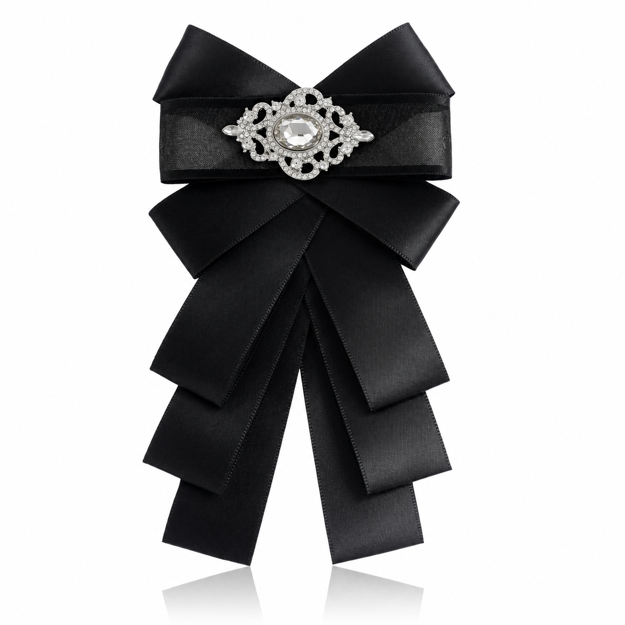 Brosa de dama din satin negru in forma de funda cu detalii pliatede 16 cm lungime si catarama centrala incrustata cu cristale.