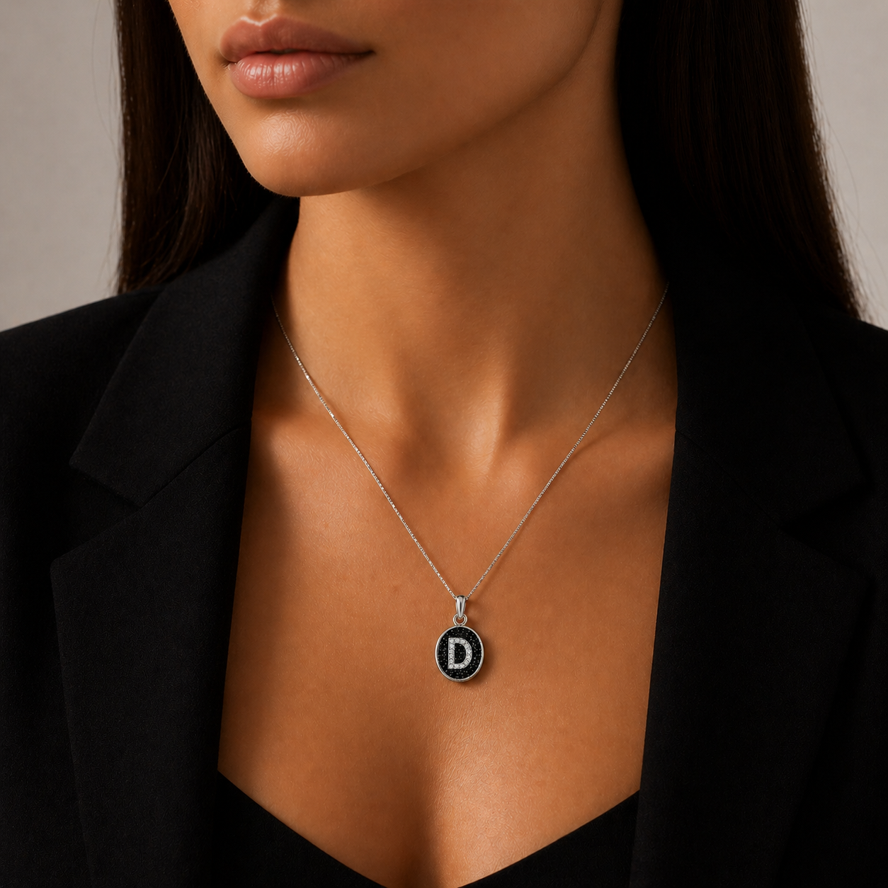 Colier din argint 925 rodiat cu pandantiv oval, fundal din diamante CZ negre si litera D din diamante CZ albe montate micropave, la gat