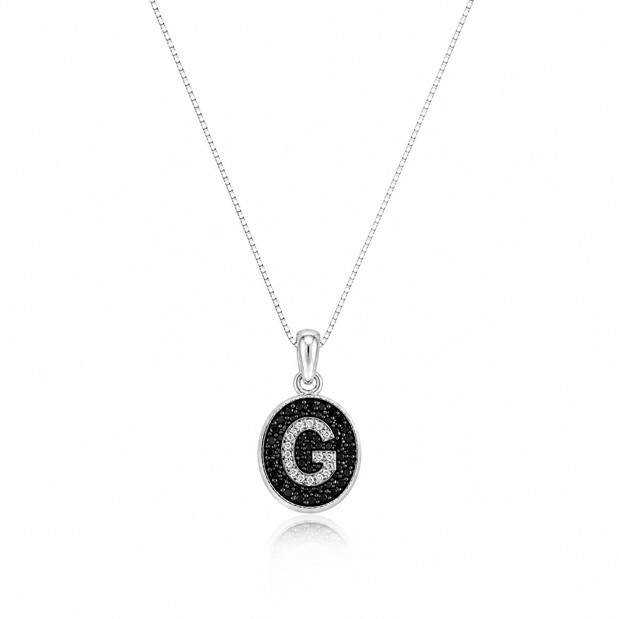 Colier din argint 925 rodiat cu pandantiv oval, fundal din diamante CZ negre si litera G din diamante CZ albe montate micropave