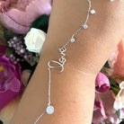 Bratara din argint 925 rodiat cu scris "Love" si charms-uri cu diamante CZ albe Bratara Lasardo Gioielli