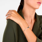 bratara dama la petite story din tel inoxidabil 316 L hipoalergenic, placat pvd cu rodiu cu perle de cultura si charm inima purtata la mana