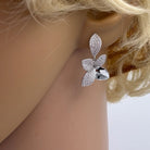 cercei din argint 925 rodiat in forma de floare cu petale diamante cz montate micropave