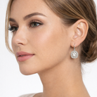 cercei din argint 925 rodiat cu tortita si diamante cz asscher cut si round cut la ureche