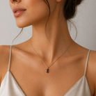 colier din argint 925 rodiat rose gold cu pandantiv semnul infinitului diamante cz negre, purtat la gat