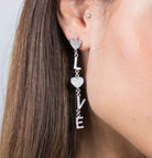 Cercei asimetrici din argint 925 rodiat cu diamante CZ albe Cercei Lasardo Gioielli